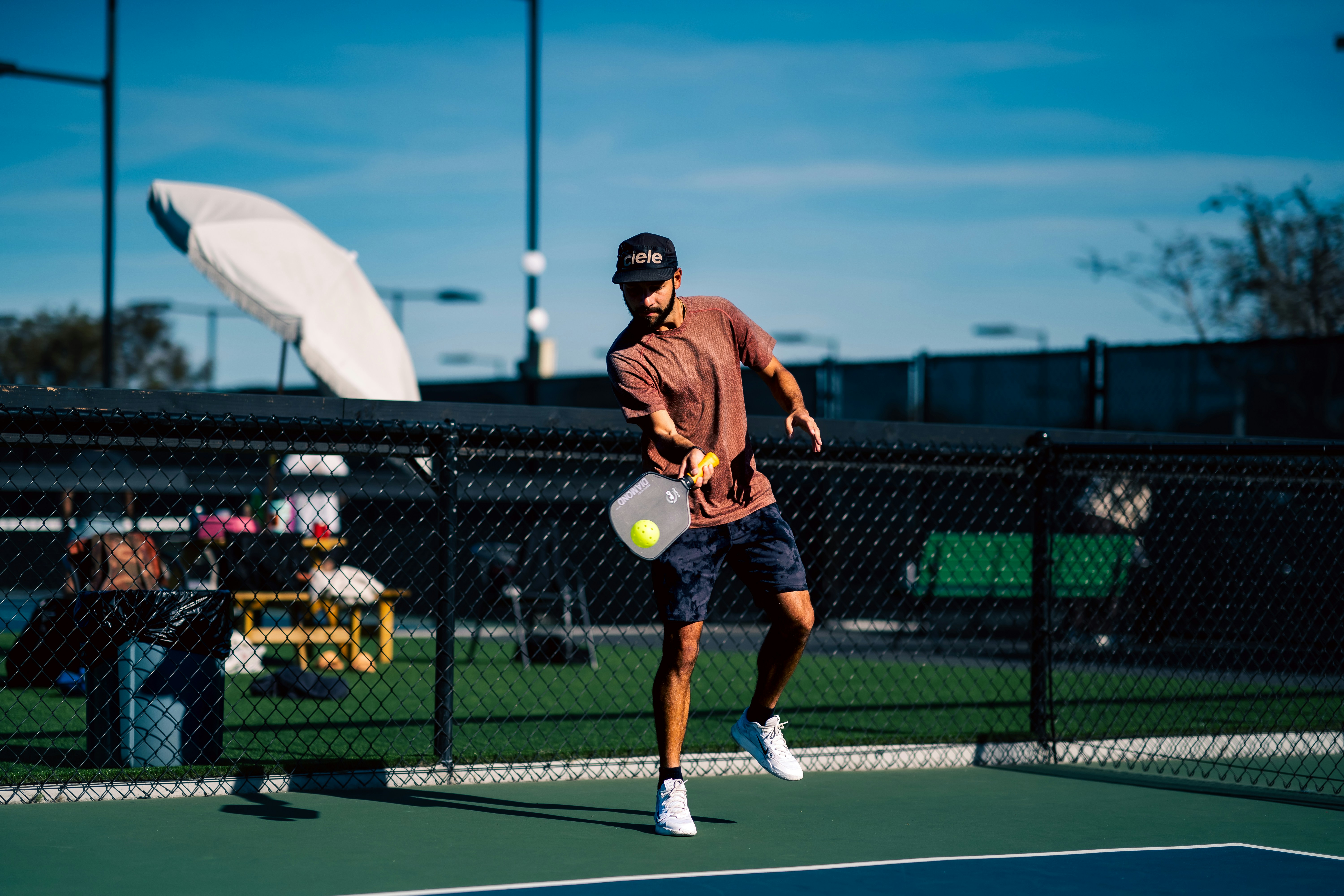 Pickleball player in action on a court